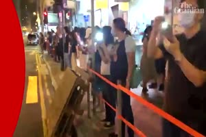 Hong Kong protesters form 30-mile human chain across city