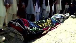 Families bury victims as Afghan school blast toll rises