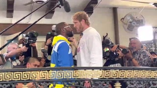 FLOYD MAYWEATHER STEPS TO LOGAN PAUL DURING FACE TO FACE AT FINAL PRES