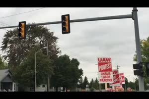 UAW workers strike outside of GM Powertrain in Bay City