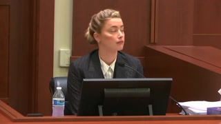 Amber Heard questioned about claims that she assaulted her ex-wife 