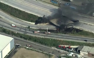 The Philadelphia overpass collapses in aerial footage taken from I-95
