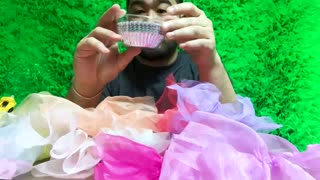 Tomo Koizumi uses his infamous multi-coloured tulle to whip up some ru
