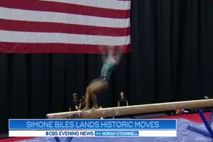 Simone Biles makes history with a triple-double